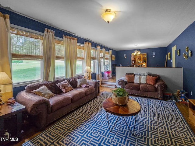1382 Elijah Martin Rd, Whitesburg, TN 37891 - living room featuring wood finished floors and a chandelier