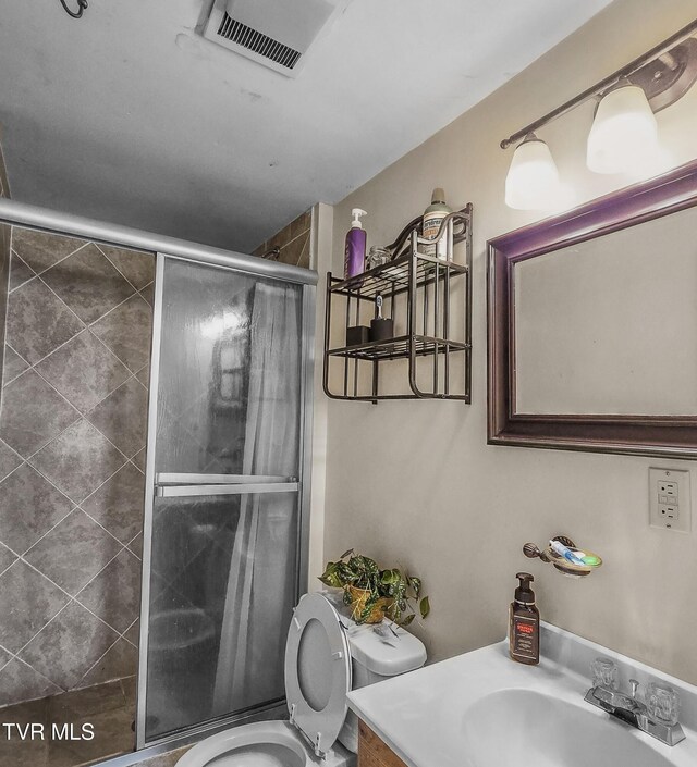 1382 Elijah Martin Rd, Whitesburg, TN 37891 - bathroom featuring a stall shower, toilet, and vanity
