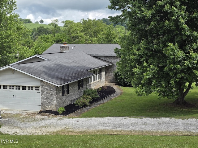 1382 Elijah Martin Rd, Whitesburg, TN 37891 - view of front of property featuring a shingled roof, driveway, a chimney, a front yard, and a garage