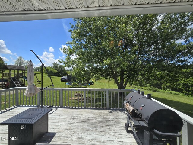 1382 Elijah Martin Rd, Whitesburg, TN 37891 - deck featuring a yard and a playground