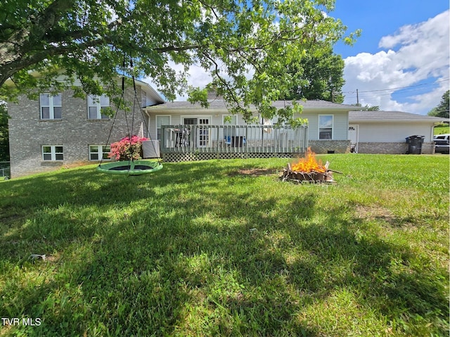 1382 Elijah Martin Rd, Whitesburg, TN 37891 - rear view of property with an outdoor fire pit and a lawn