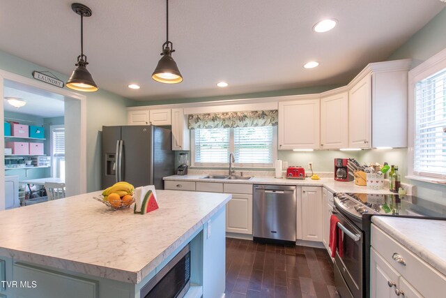 435 Sulpher Spring Rd, Chilhowie, VA 24319 - kitchen with appliances with stainless steel finishes, a sink, white cabinetry, light countertops, and recessed lighting