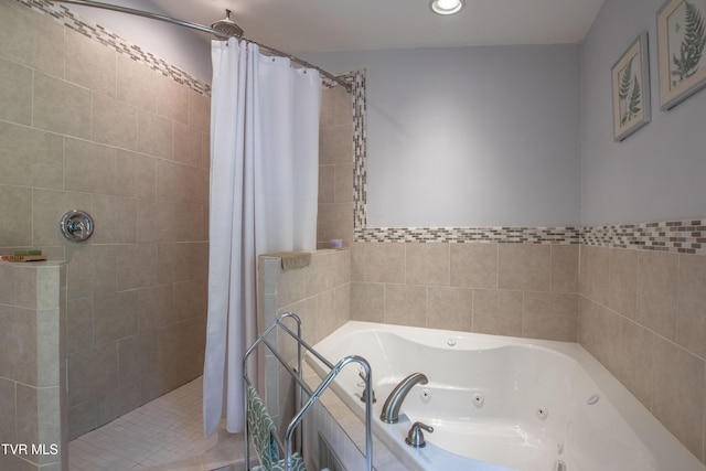 435 Sulpher Spring Rd, Chilhowie, VA 24319 - bathroom with a whirlpool tub, tiled shower, and recessed lighting