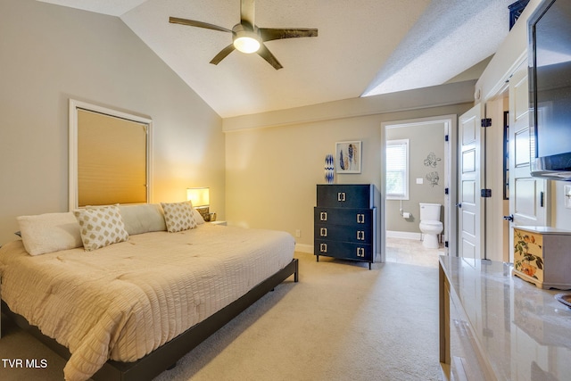 309 Crouch Rd, Gray, TN 37615 - bedroom featuring vaulted ceiling, light carpet, ensuite bath, baseboards, and ceiling fan