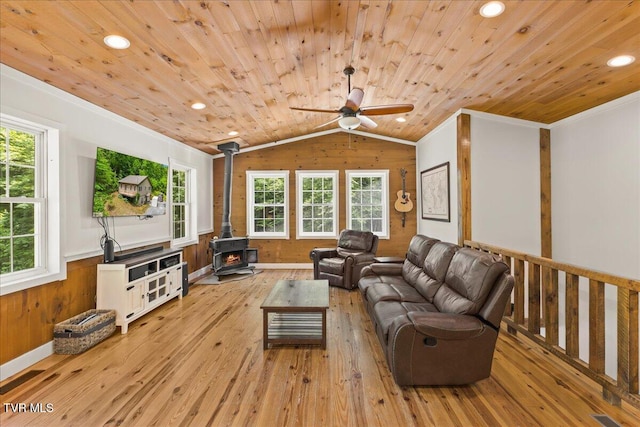 108 Chock Creek Rd, Johnson City, TN 37601 - living area featuring a wood stove, light wood-type flooring, wooden ceiling, crown molding, and a ceiling fan
