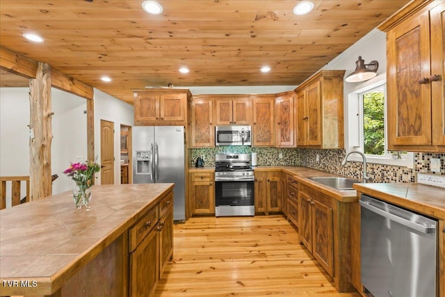 108 Chock Creek Rd, Johnson City, TN 37601 - kitchen with stainless steel appliances, tile countertops, a sink, light wood-type flooring, and recessed lighting