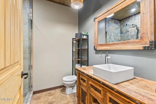 108 Chock Creek Rd, Johnson City, TN 37601 - bathroom featuring a stall shower, toilet, vanity, and baseboards
