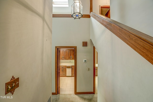 153 Columbine Rd, Kingsport, TN 37660 - stairway featuring a high ceiling and baseboards