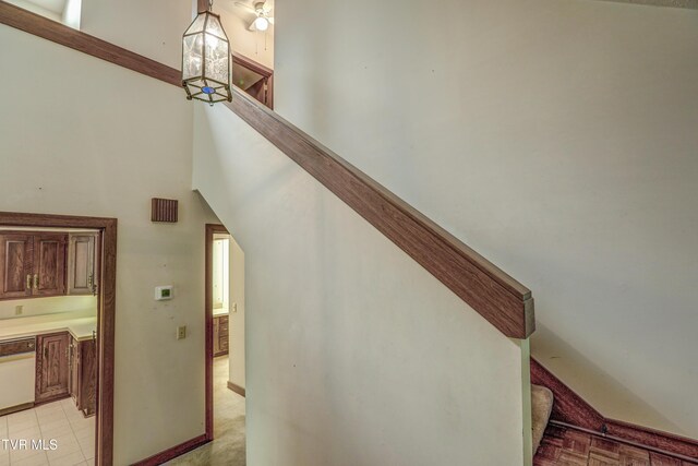 153 Columbine Rd, Kingsport, TN 37660 - staircase featuring a high ceiling and baseboards
