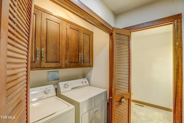 153 Columbine Rd, Kingsport, TN 37660 - clothes washing area featuring separate washer and dryer, cabinet space, and light carpet