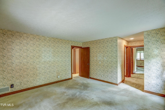 153 Columbine Rd, Kingsport, TN 37660 - empty room featuring wallpapered walls, carpet floors, and baseboards