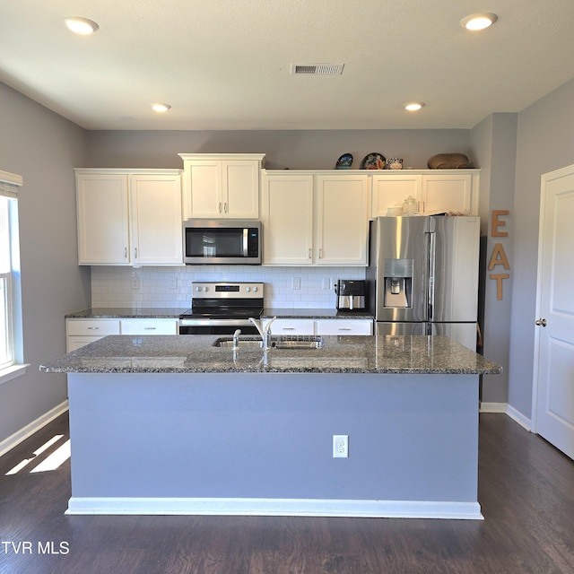 2358 Stream View Ln, Morristown, TN 37814 - kitchen featuring appliances with stainless steel finishes, baseboards, dark stone counters, and recessed lighting