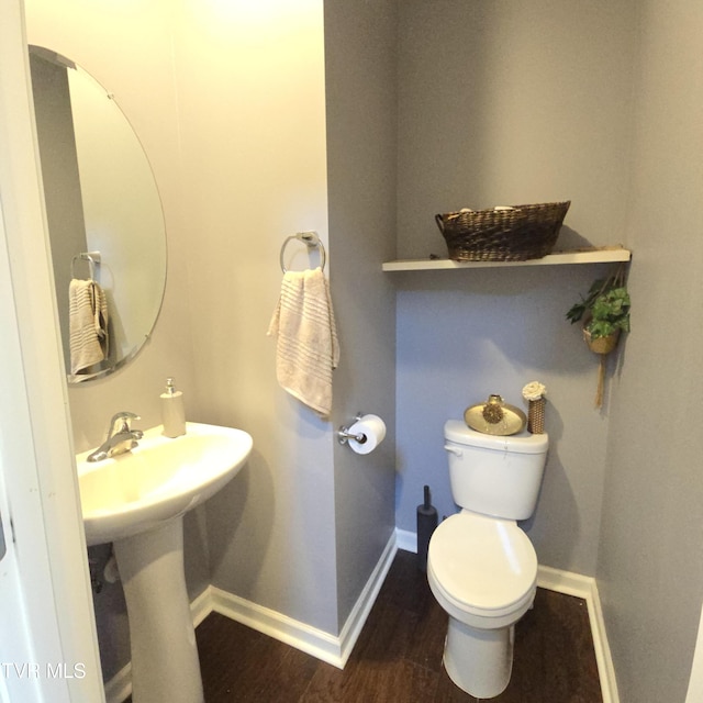 2358 Stream View Ln, Morristown, TN 37814 - half bathroom featuring wood finished floors, baseboards, toilet, and a sink