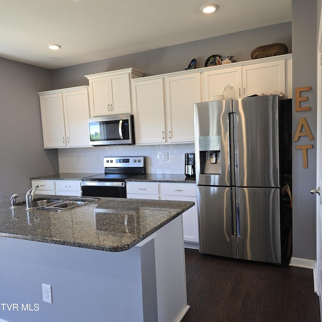 2358 Stream View Ln, Morristown, TN 37814 - kitchen featuring appliances with stainless steel finishes, white cabinetry, dark wood finished floors, a sink, and recessed lighting