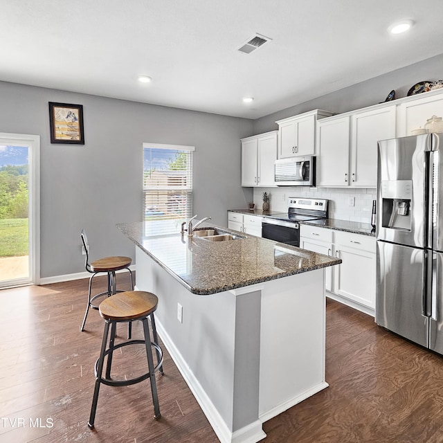 2358 Stream View Ln, Morristown, TN 37814 - kitchen with stainless steel appliances, a sink, dark wood-style flooring, healthy amount of natural light, and recessed lighting
