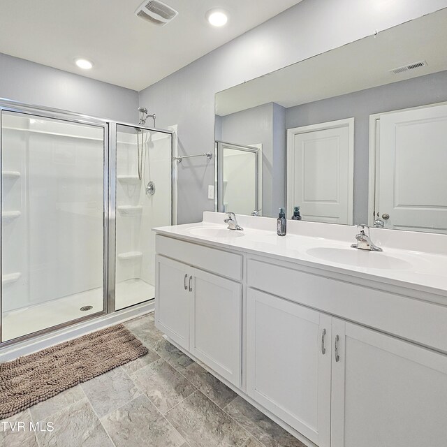 2358 Stream View Ln, Morristown, TN 37814 - bathroom featuring double vanity, a stall shower, and recessed lighting