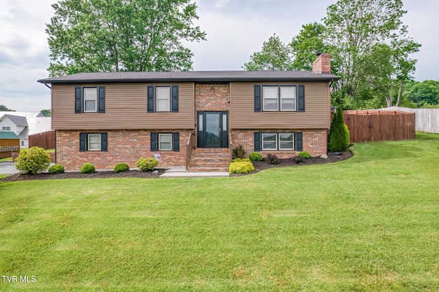 115 Dover Ln, Bristol, TN 37620 - split foyer home with a chimney and brick siding