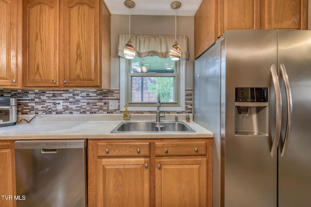 115 Dover Ln, Bristol, TN 37620 - kitchen with stainless steel appliances, a sink, decorative backsplash, and light countertops