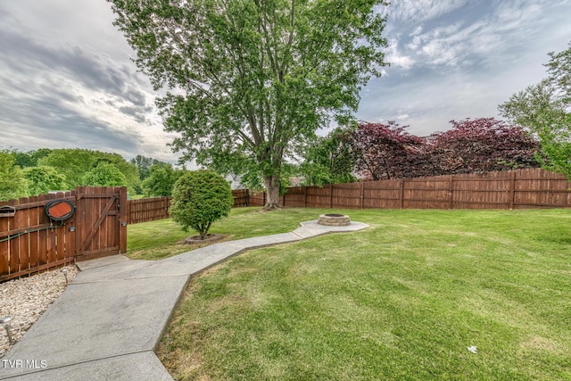 115 Dover Ln, Bristol, TN 37620 - view of yard with an outdoor fire pit and a gate