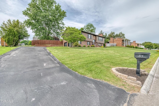 115 Dover Ln, Bristol, TN 37620 - view of front of house featuring a residential view and asphalt driveway