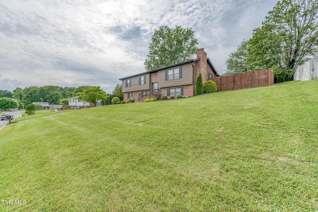 115 Dover Ln, Bristol, TN 37620 - view of front facade featuring a chimney and brick siding