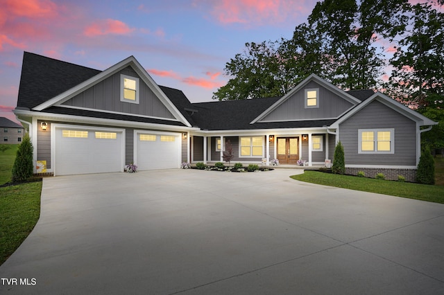 5541 Hester Ct, Piney Flats, TN 37686 - view of front of property with board and batten siding, covered porch, driveway, and a shingled roof