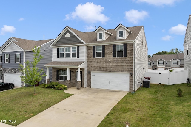 478 Brinkleys Way, Johnson City, TN 37615 - view of front of property featuring brick siding, an attached garage, concrete driveway, central air condition unit, and a shingled roof
