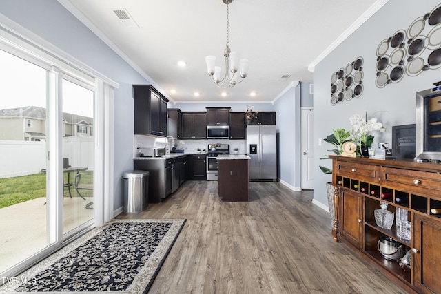 478 Brinkleys Way, Johnson City, TN 37615 - kitchen with appliances with stainless steel finishes, light countertops, a chandelier, ornamental molding, and decorative light fixtures