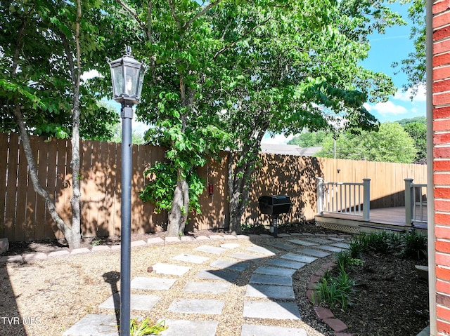 108 S Rogers St, Rogersville, TN 37857 - fenced backyard featuring a deck