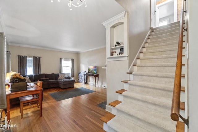 108 S Rogers St, Rogersville, TN 37857 - living room with stairway, ornamental molding, and hardwood / wood-style floors