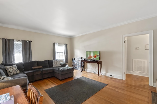 108 S Rogers St, Rogersville, TN 37857 - living room featuring crown molding and light wood finished floors