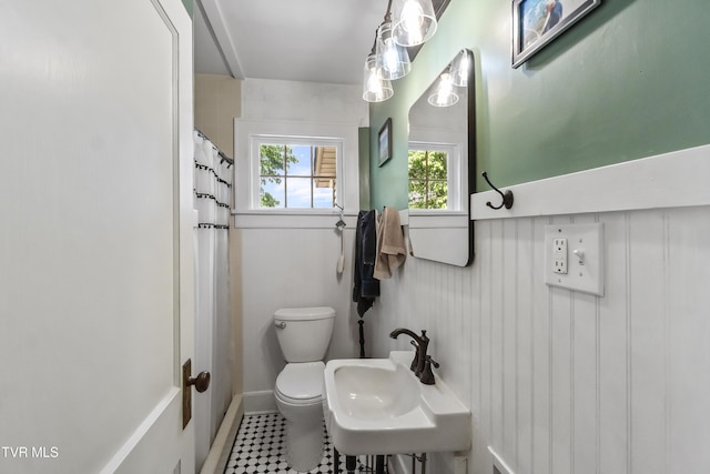 108 S Rogers St, Rogersville, TN 37857 - full bath featuring a sink, toilet, baseboards, and a shower with curtain