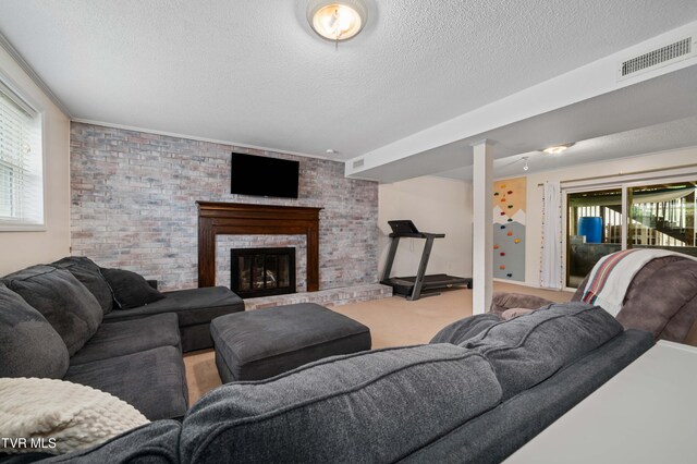 137 Highland Rd, Jonesborough, TN 37659 - carpeted living area featuring a textured ceiling and a brick fireplace