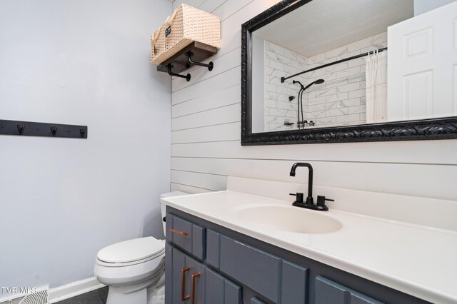 137 Highland Rd, Jonesborough, TN 37659 - full bath with wood walls, toilet, vanity, a shower with shower curtain, and baseboards