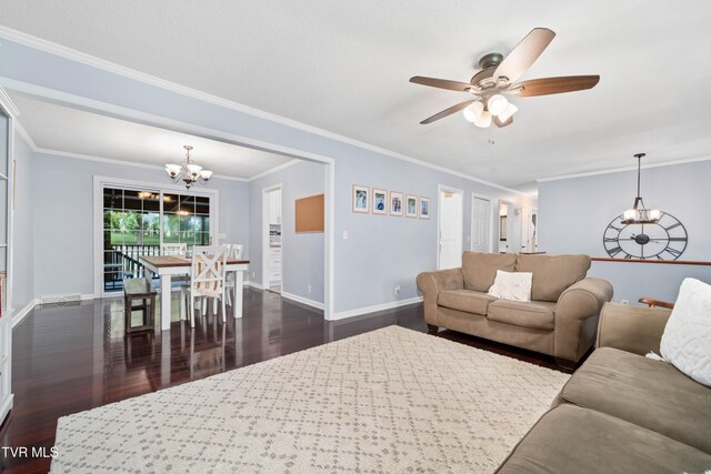 137 Highland Rd, Jonesborough, TN 37659 - living room with a chandelier, dark wood-style floors, ceiling fan, crown molding, and baseboards
