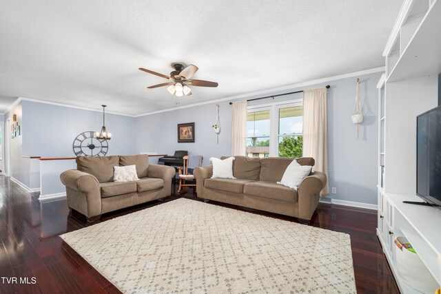 137 Highland Rd, Jonesborough, TN 37659 - living room featuring a ceiling fan, dark wood finished floors, crown molding, baseboards, and a chandelier