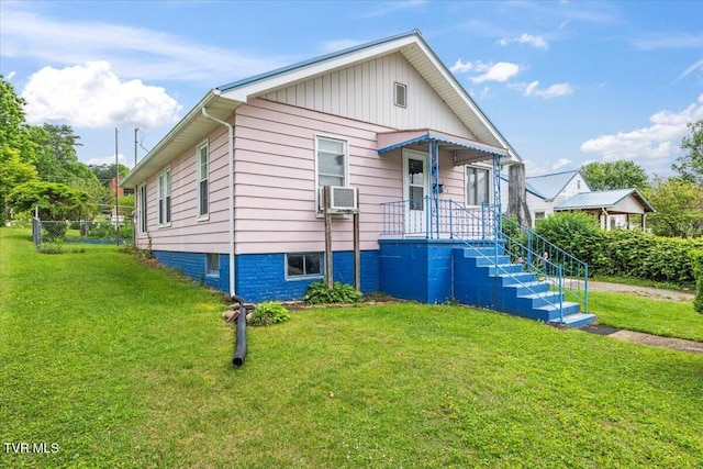 648 Maple Ave, Erwin, TN 37650 - view of front facade with a front lawn, cooling unit, and board and batten siding