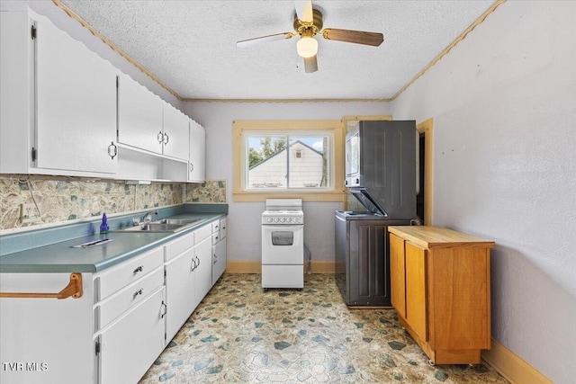 648 Maple Ave, Erwin, TN 37650 - kitchen with electric stove, a sink, a ceiling fan, white cabinets, and a textured ceiling