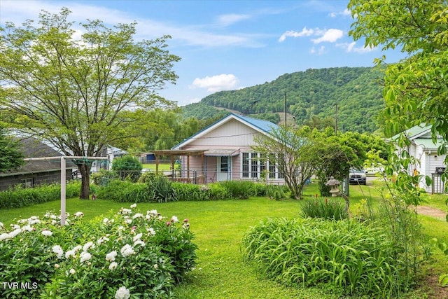 648 Maple Ave, Erwin, TN 37650 - view of front of house with a front lawn, a mountain view, and a forest view