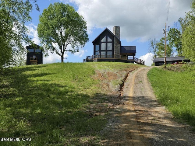 833 Duck Creek Rd, Sneedville, TN 37869 - view of front of property featuring a chimney and dirt driveway