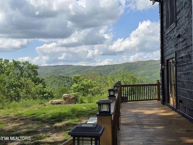 833 Duck Creek Rd, Sneedville, TN 37869 - wooden terrace with a forest view
