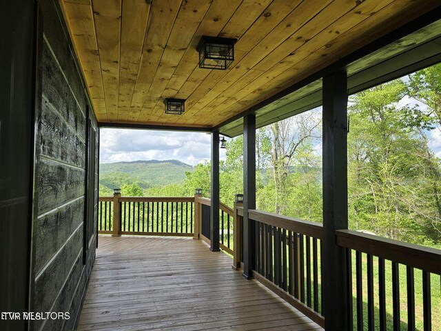833 Duck Creek Rd, Sneedville, TN 37869 - wooden terrace featuring a mountain view