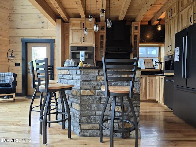 833 Duck Creek Rd, Sneedville, TN 37869 - kitchen with black appliances, healthy amount of natural light, wooden ceiling, light wood-style floors, and beam ceiling