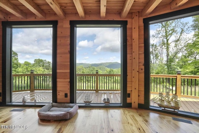 833 Duck Creek Rd, Sneedville, TN 37869 - entryway featuring beam ceiling, hardwood / wood-style floors, and wood ceiling