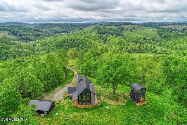 833 Duck Creek Rd, Sneedville, TN 37869 - aerial view of property and surrounding area with a heavily wooded area