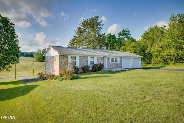 253 Fairford Ln, Blountville, TN 37617 - view of front of property with brick siding, a front lawn, and a garage