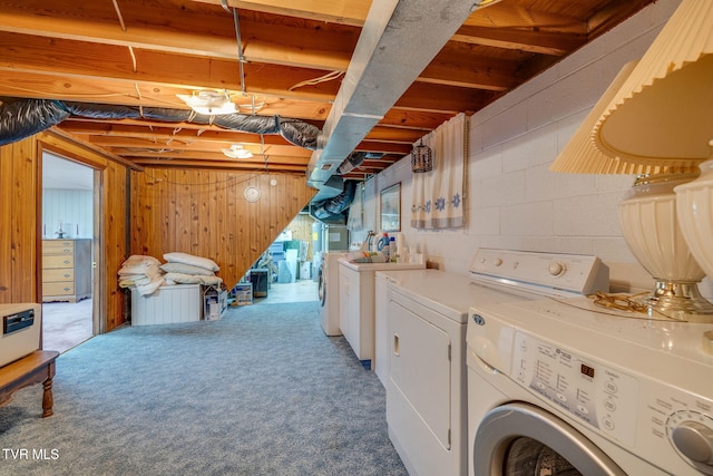 253 Fairford Ln, Blountville, TN 37617 - laundry room featuring washer and dryer, carpet flooring, wooden walls, and concrete block wall