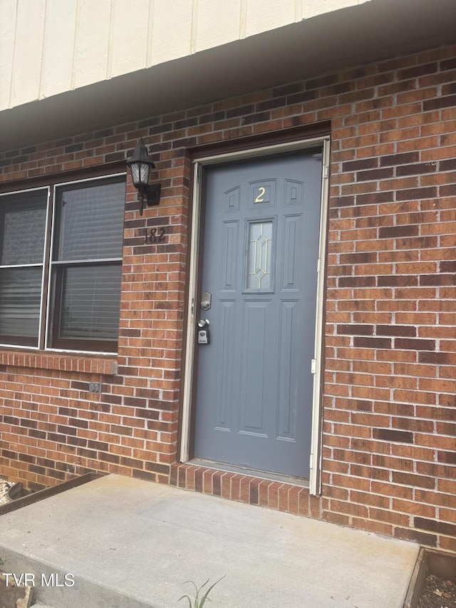 182 Oakcrest Cir Unit 2, Bristol, VA 24201 - view of exterior entry featuring brick siding