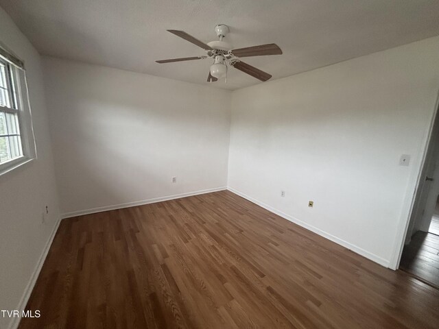 182 Oakcrest Cir Unit 2, Bristol, VA 24201 - spare room with wood finished floors, ceiling fan, and baseboards
