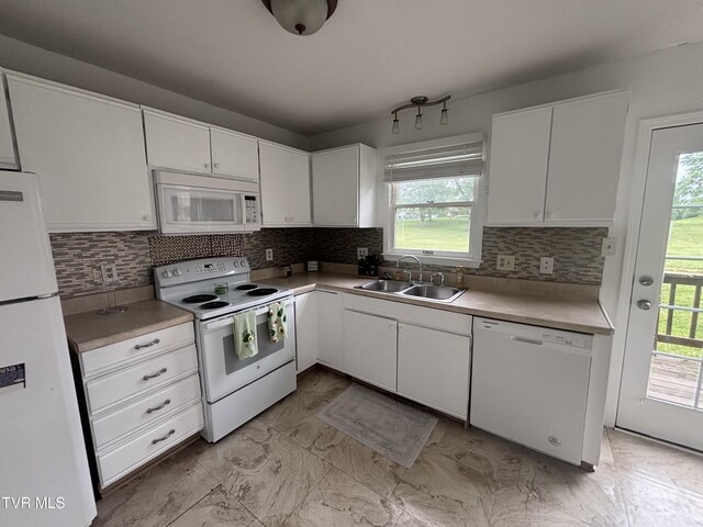 182 Oakcrest Cir Unit 2, Bristol, VA 24201 - kitchen with white appliances, a sink, white cabinets, and tasteful backsplash